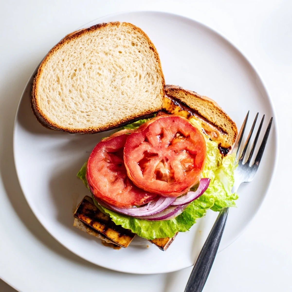 Crisp lettuce and golden smoky tofu layered in a refreshing summer TLT Sandwich