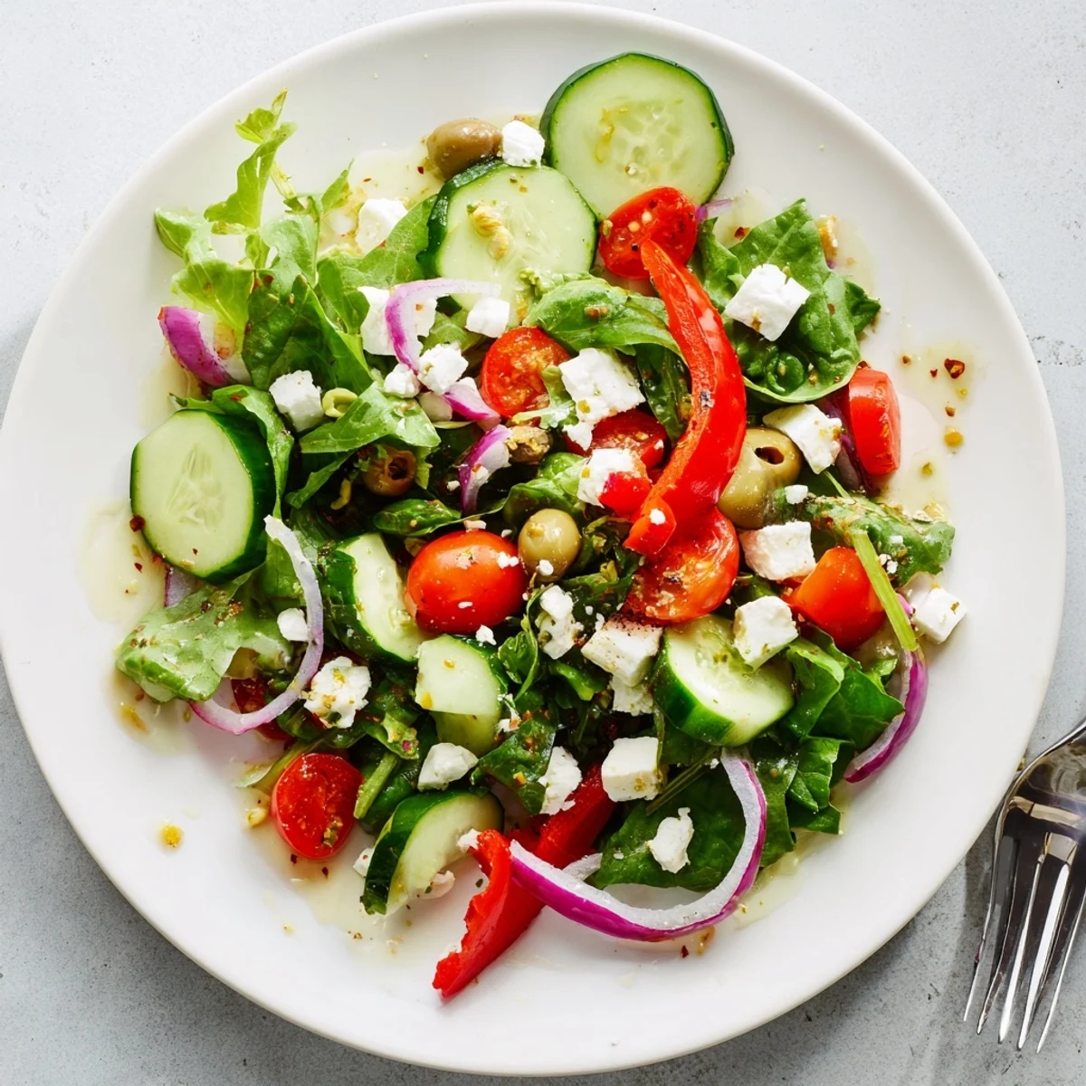 Fresh Salad Recipe: crisp greens, juicy cherry tomatoes, tossed in lemon dressing.