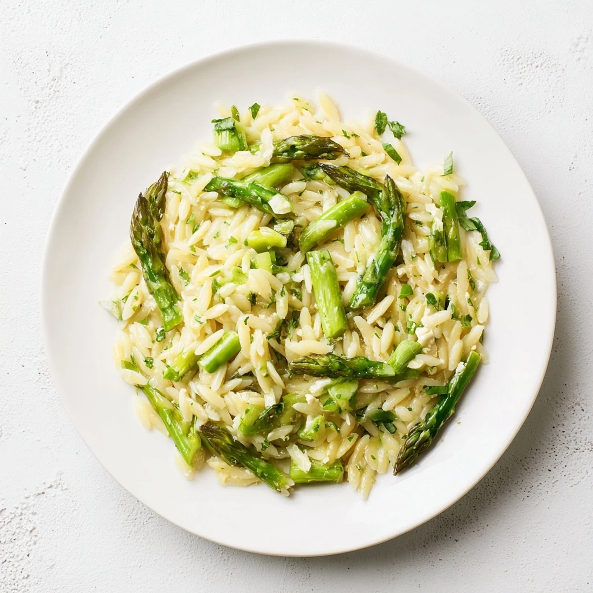 Grilled shrimp pairs with Asparagus Orzo Salad With Lemon Vinaigrette for light supper.