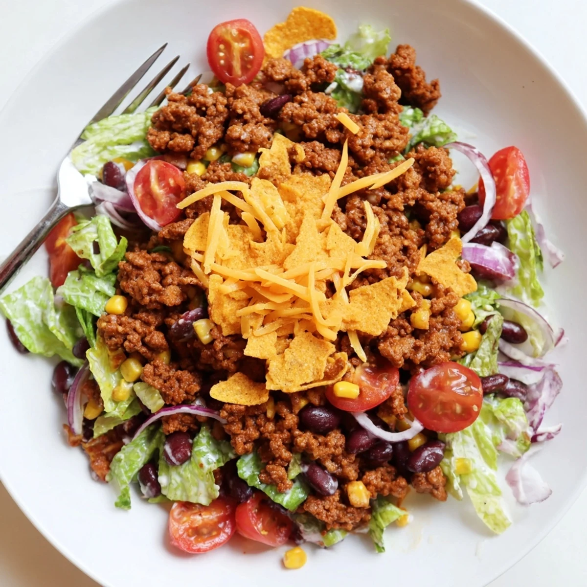 Simple Doritos Taco Salad with crunchy Nacho Cheese chips and creamy ranch