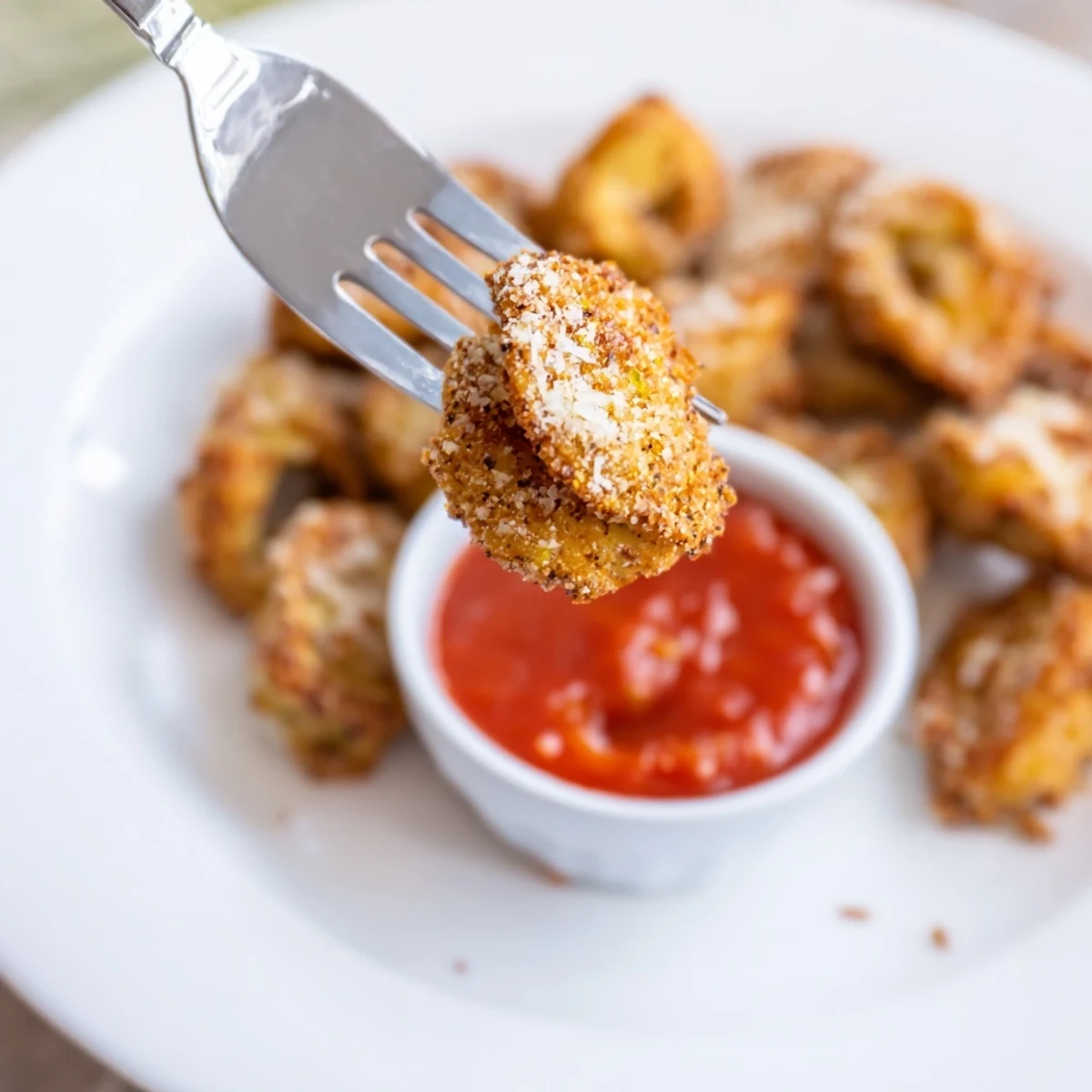 Golden, steaming bites of Crispy Tortellini Party Snacks on a party platter