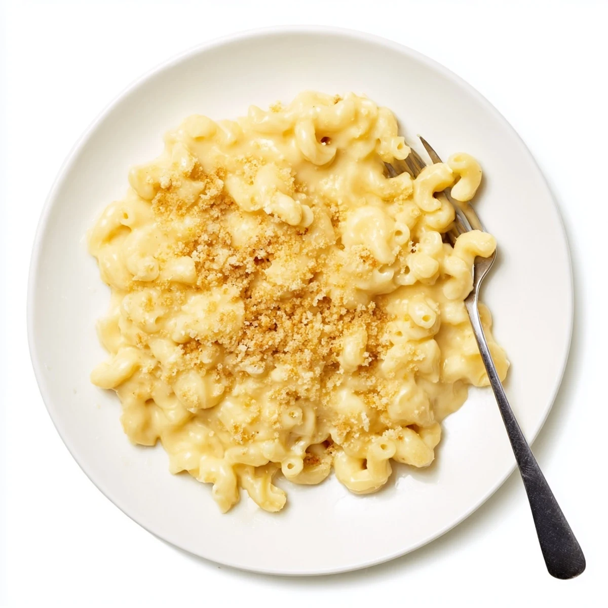 Creamy homemade mac and cheese in white bowl with rich melted cheddar sauce