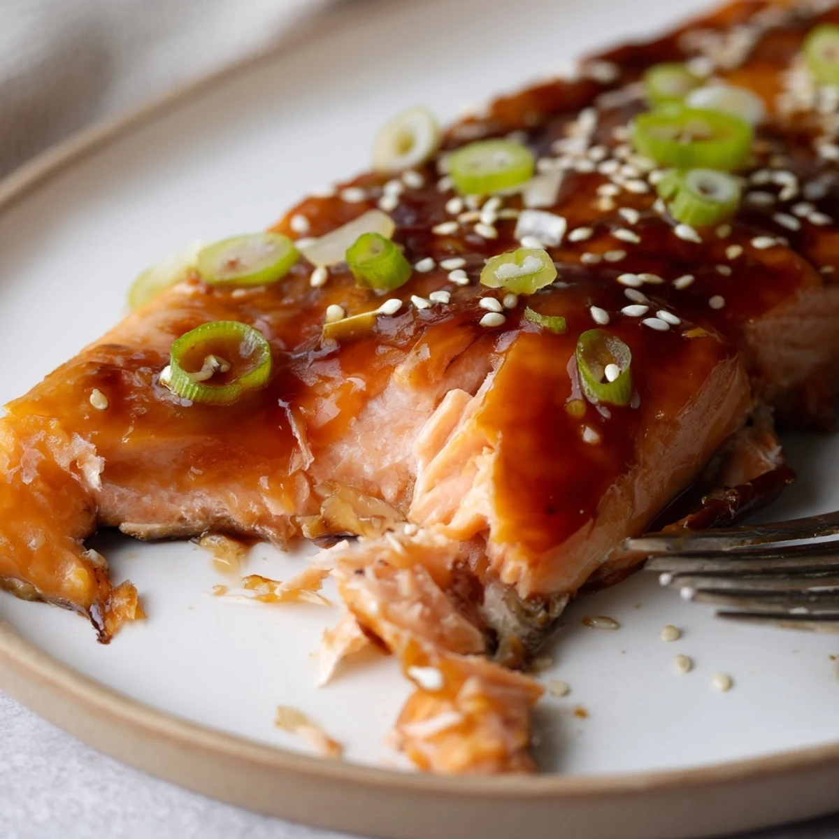 Glossy oven roasted Gluten Free Teriyaki Salmon Recipe garnished with sesame seeds