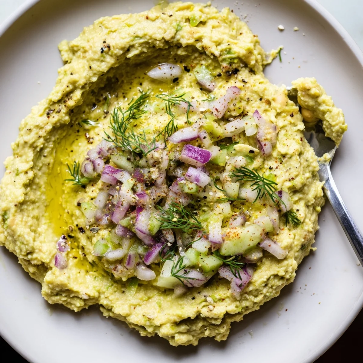 Fresh Smashed Chickpea Avocado Pickle served as sandwich filling, zesty and creamy